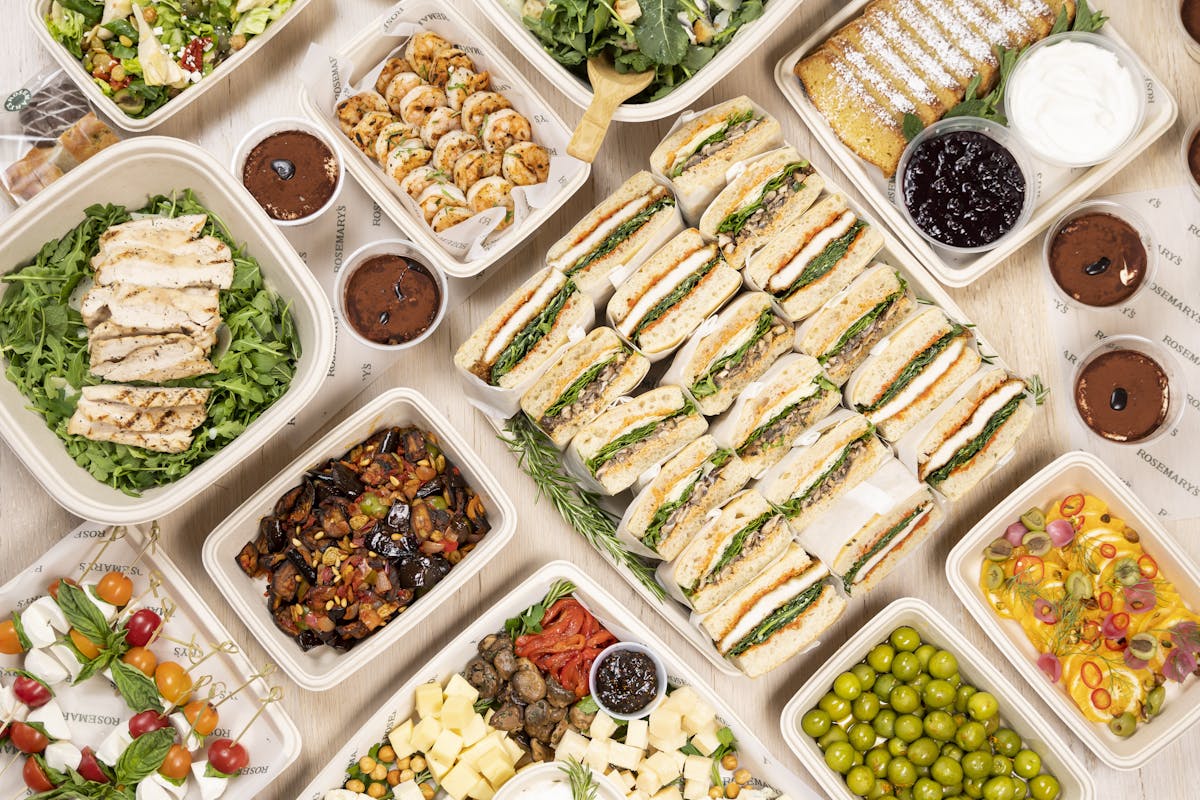 a box filled with different types of food on a table