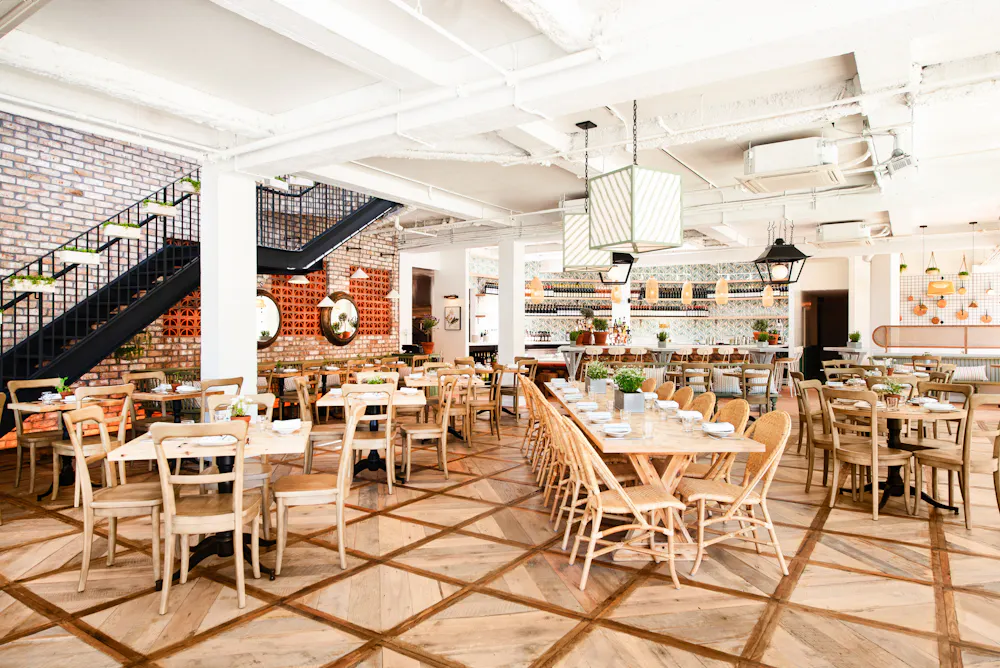 a dining room table in front of a building