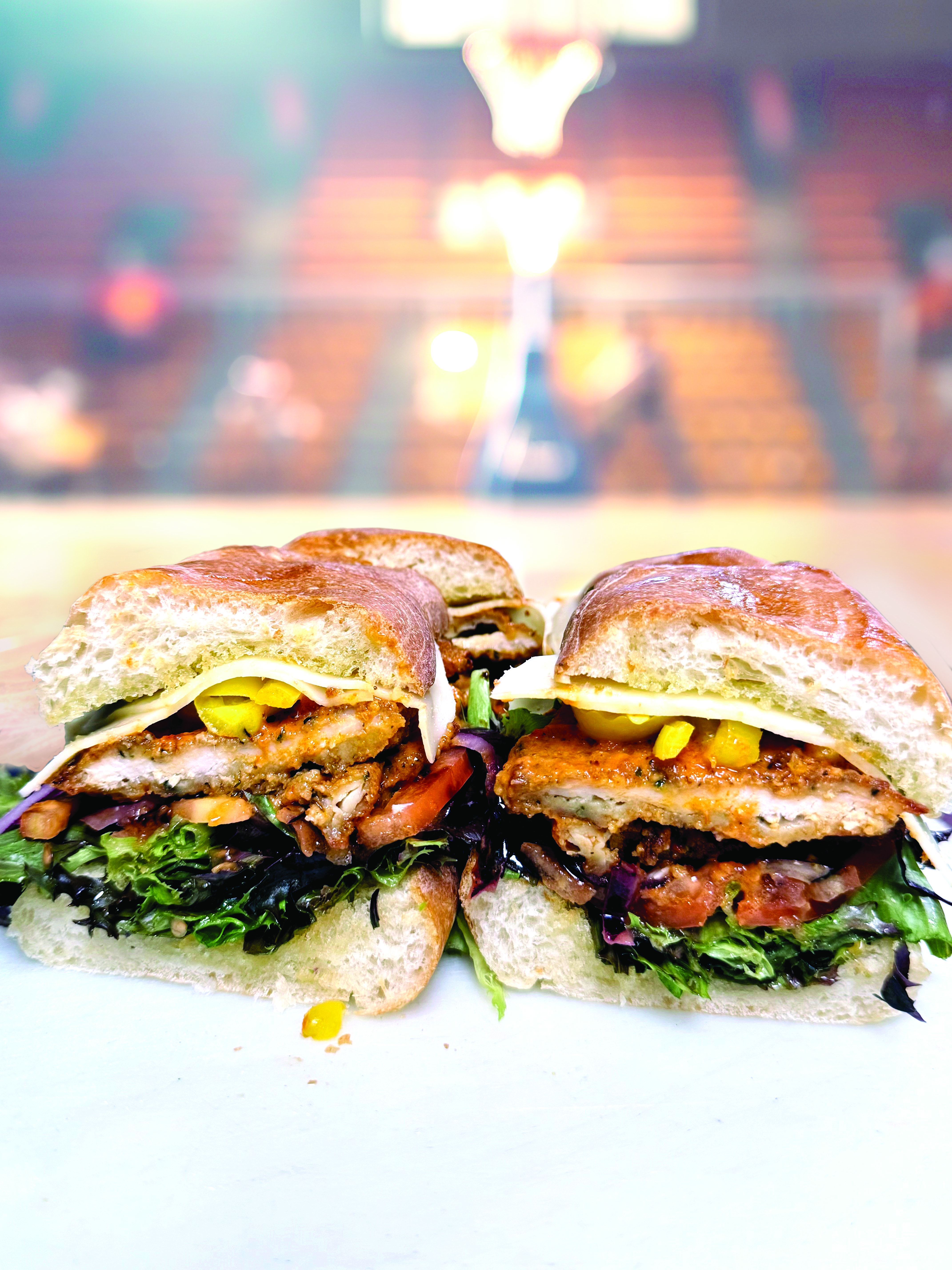 a sandwich cut in half on a plate