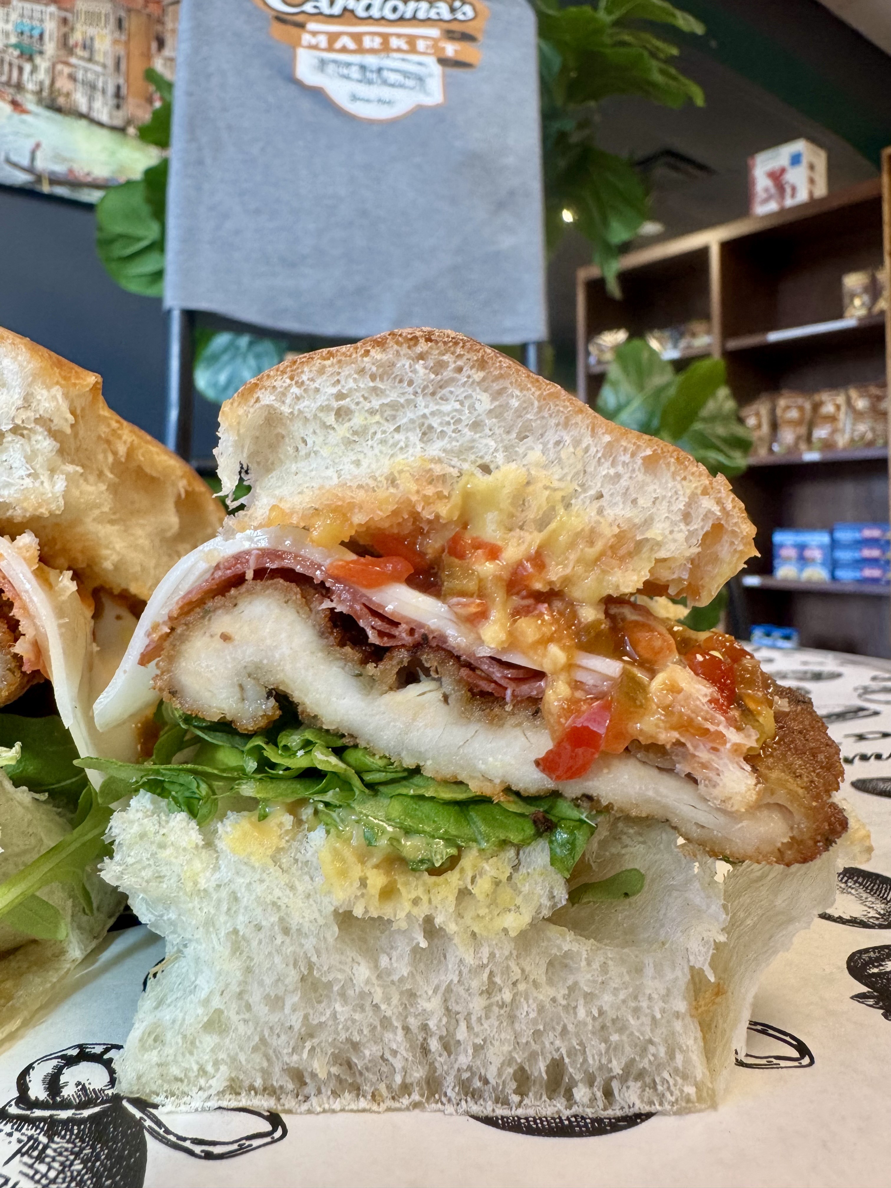 a close up of a sandwich sitting on top of a table