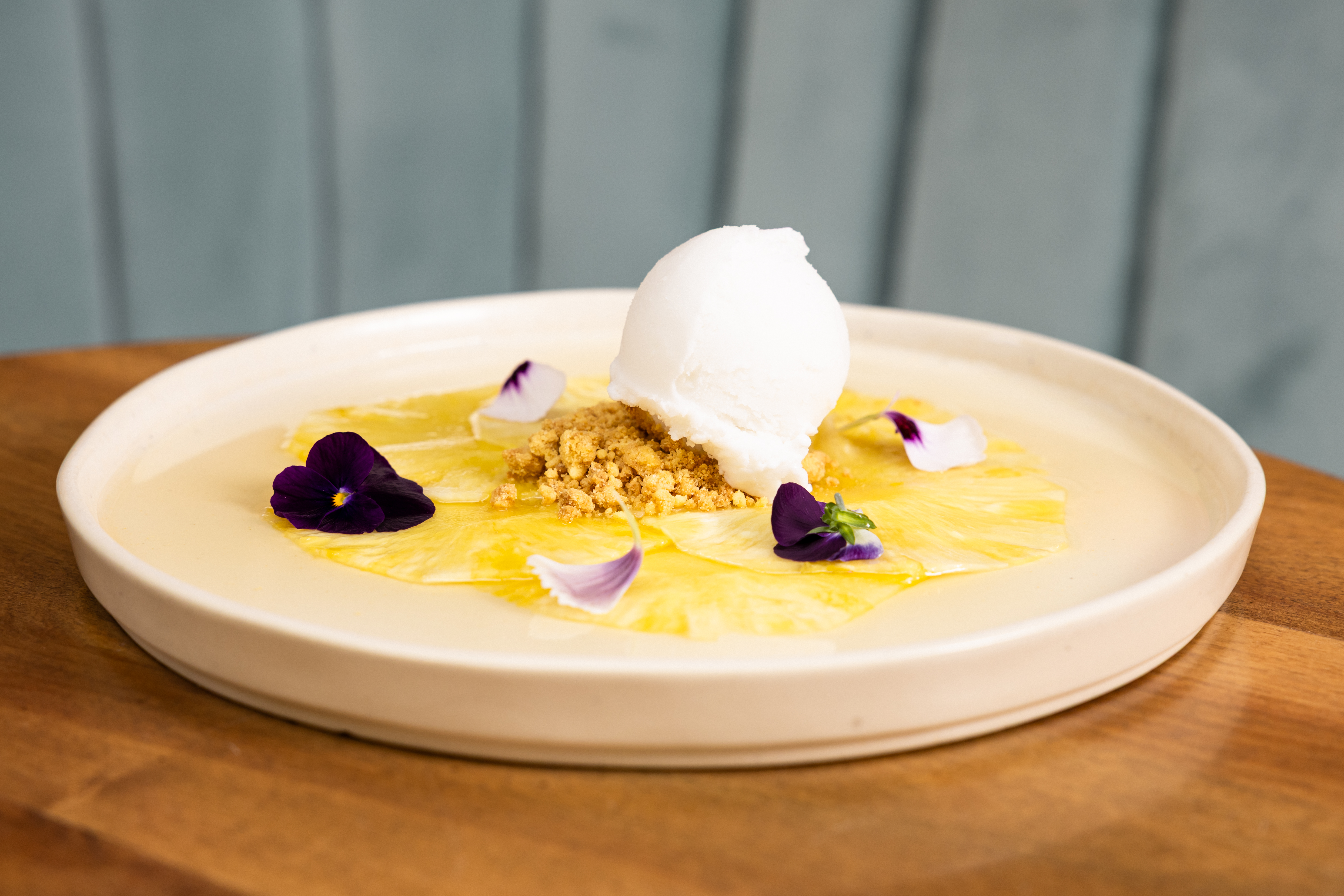 a plate of food with a scoop of ice cream on top