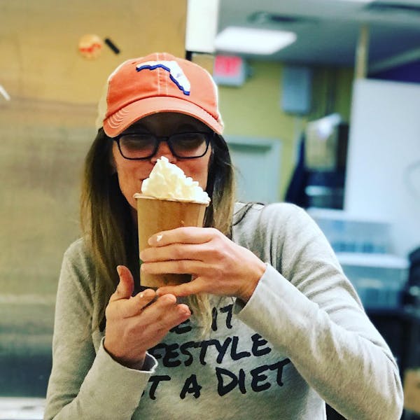 a person eating a donut