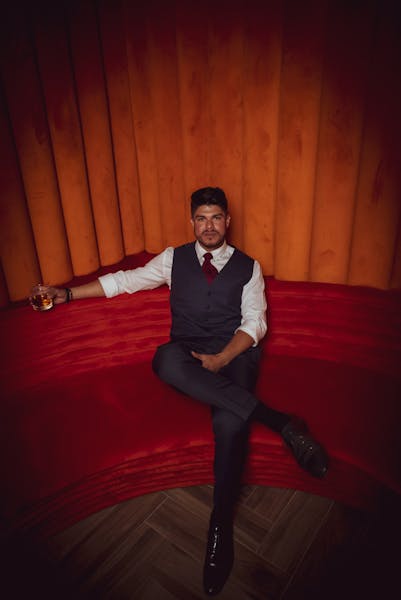 a person wearing a suit and tie