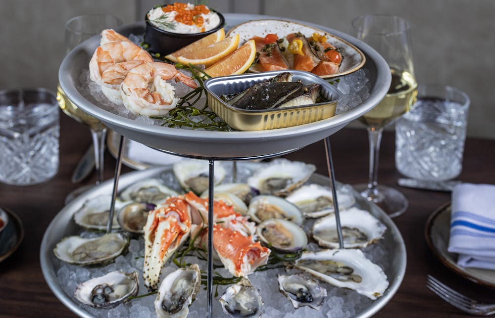 a table topped with plates of food on a plate