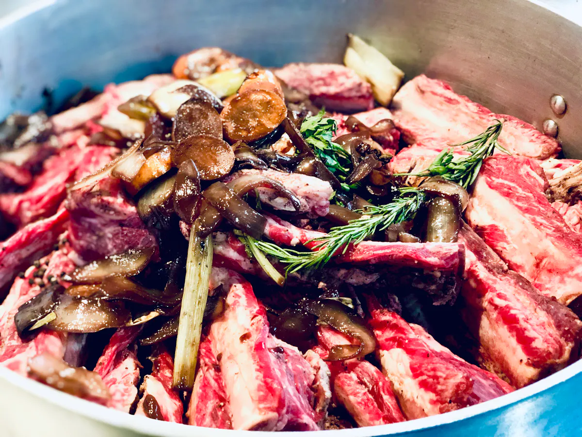 a bowl filled with meat and vegetables