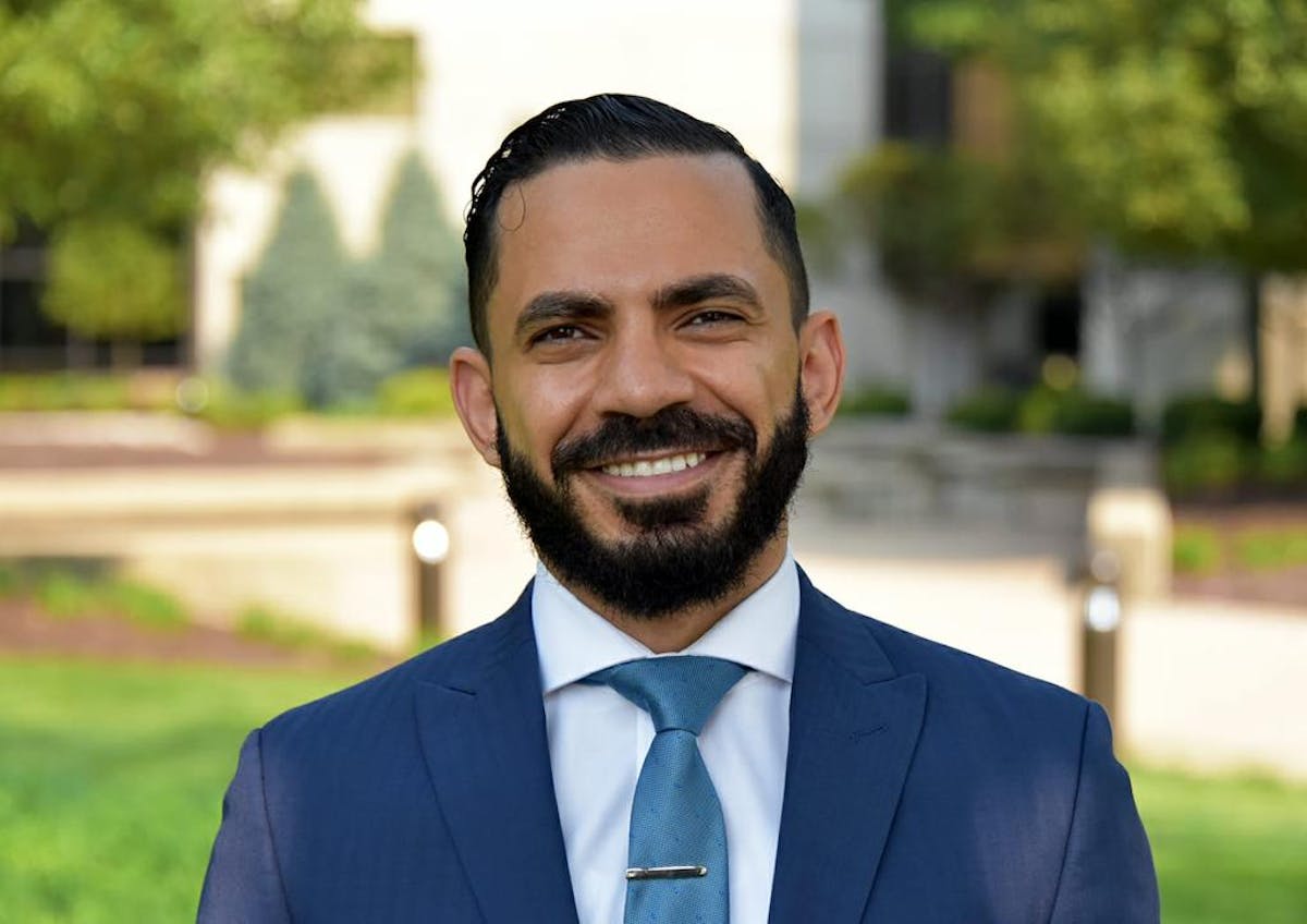 a man wearing a suite and tie