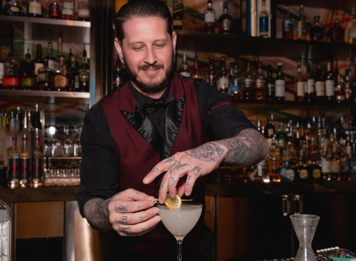 a man holding a glass of wine