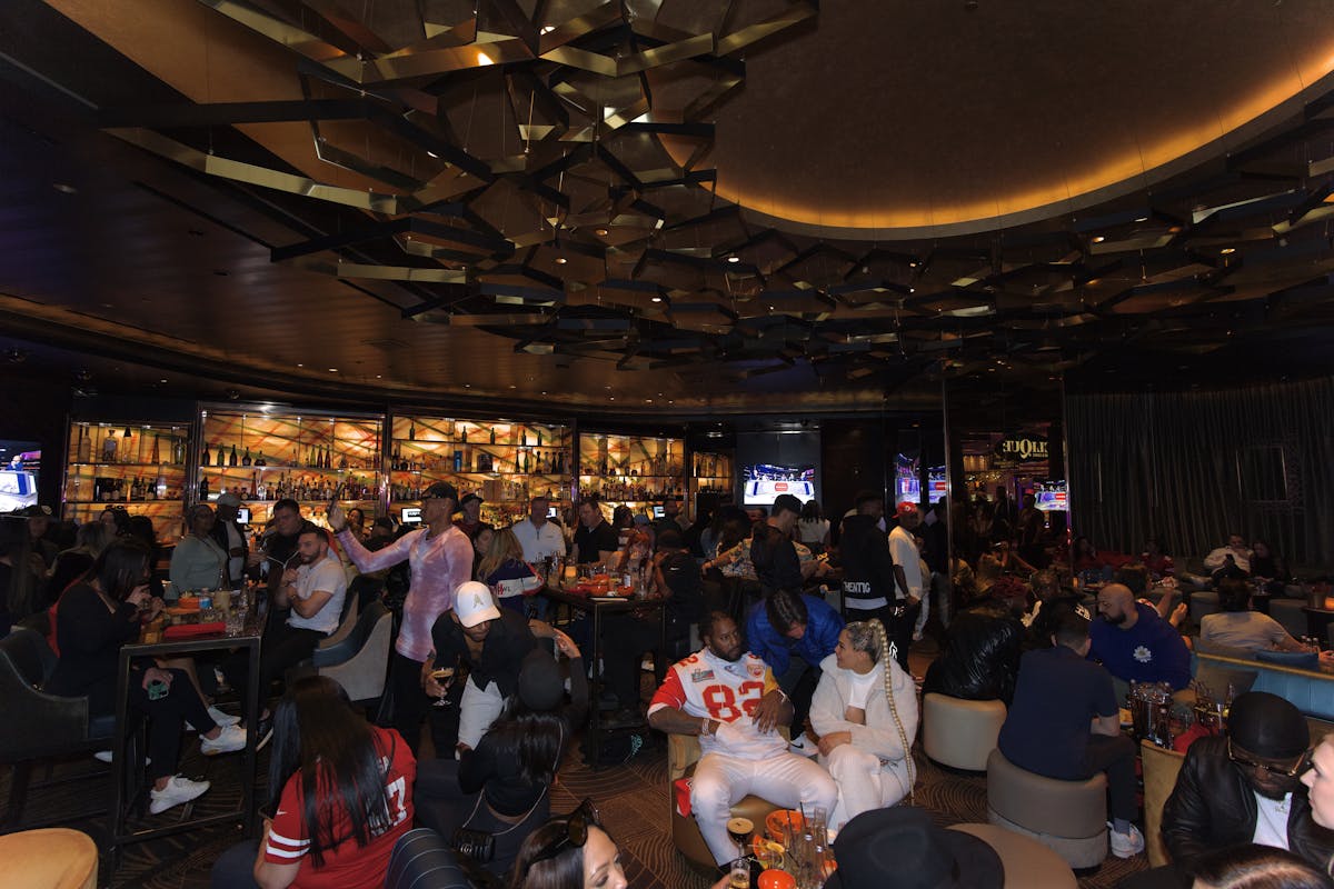 a crowd of people in a room