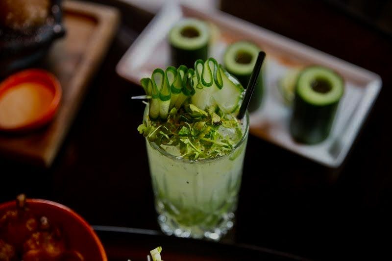 picture of a craft cocktail at a cosmopolitan lounge