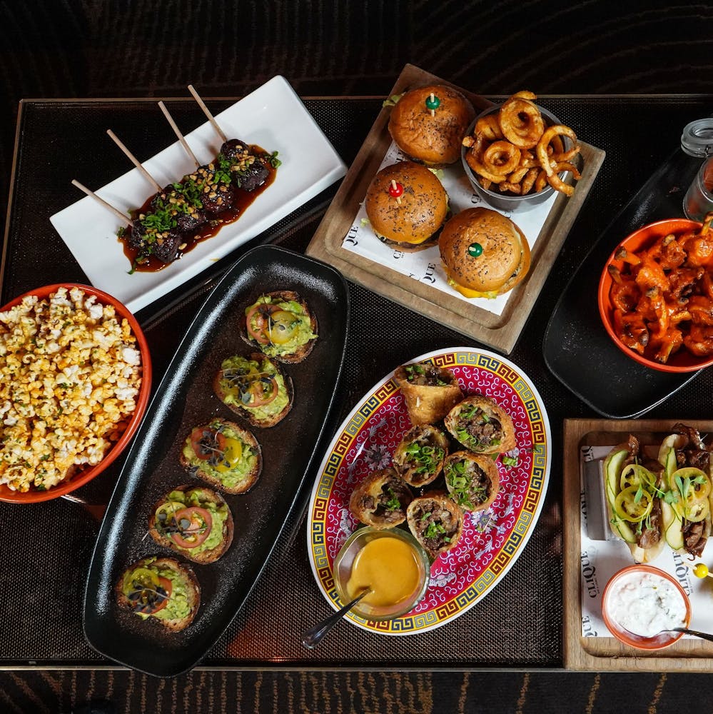 a bunch of different types of food on a table