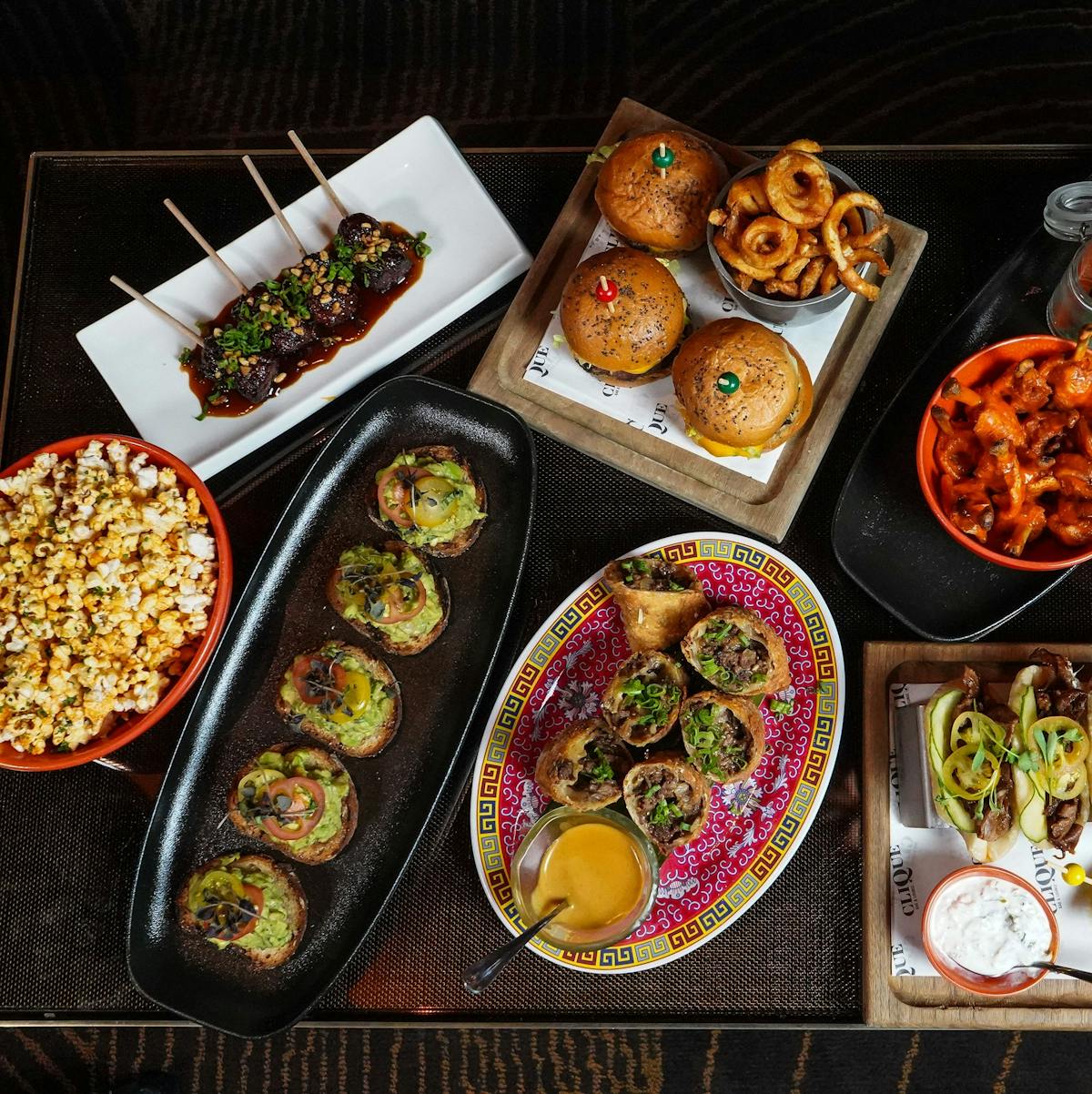 a bunch of different types of food on a table