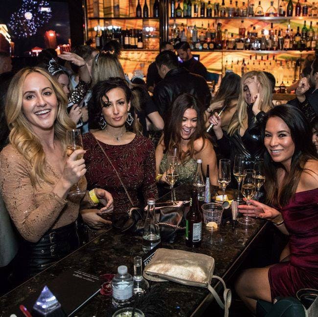 a group of people posing for the camera