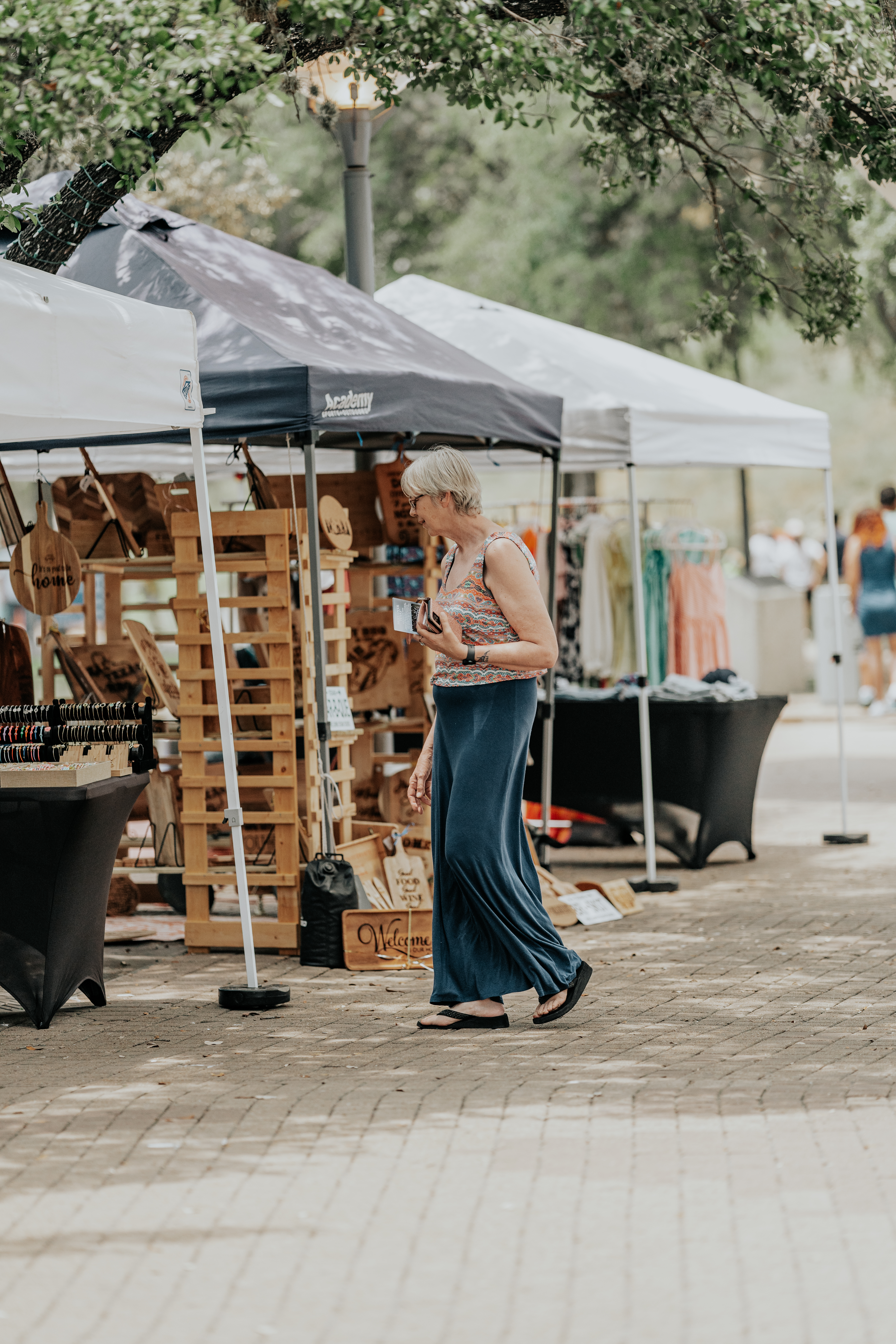 a woman walking in a street