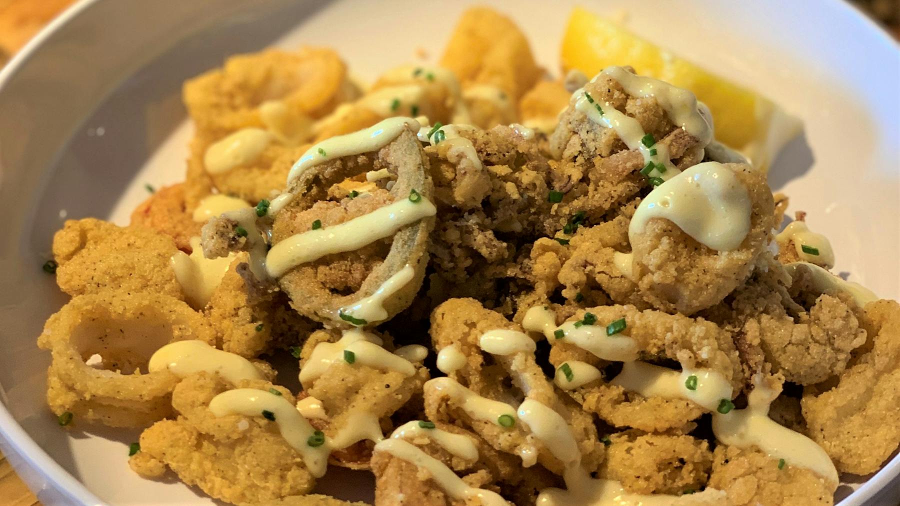 a dish is filled with different types of food on a plate