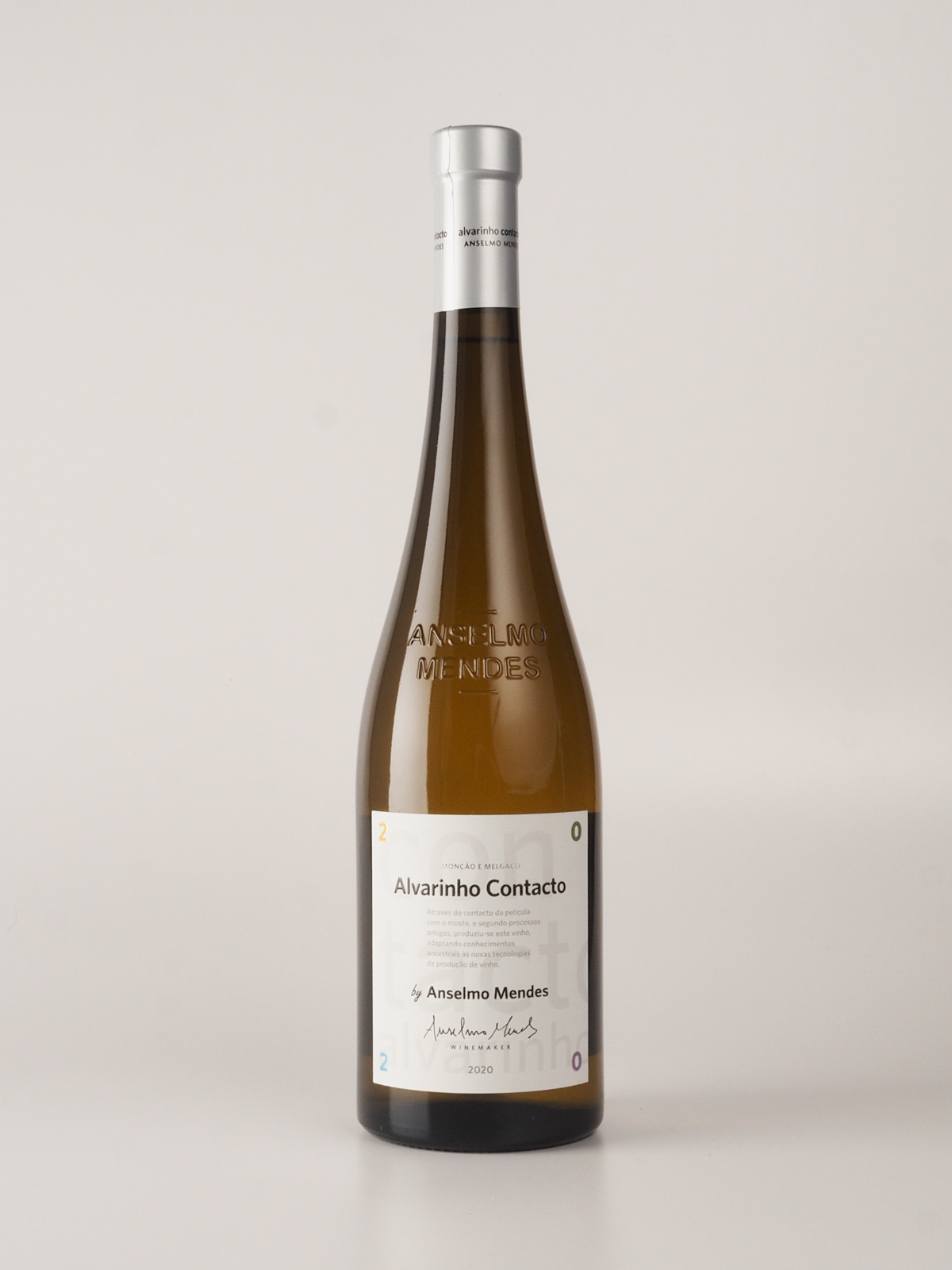 a bottle of wine with a white label