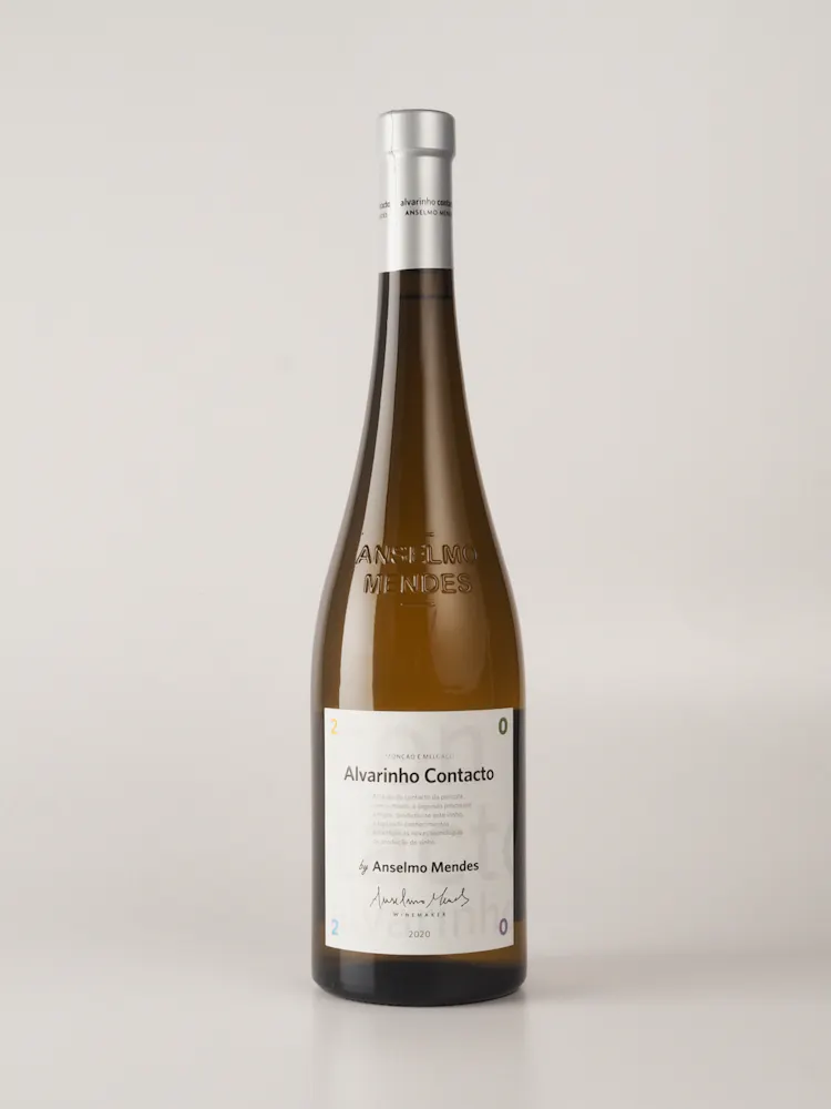 a bottle of wine with a white label