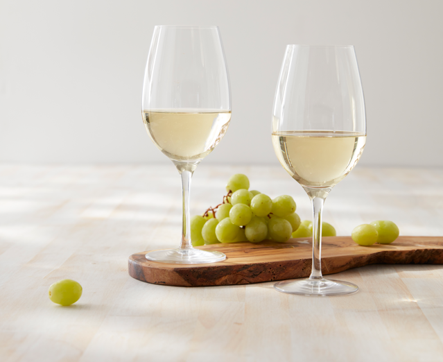 a glass of wine on a table