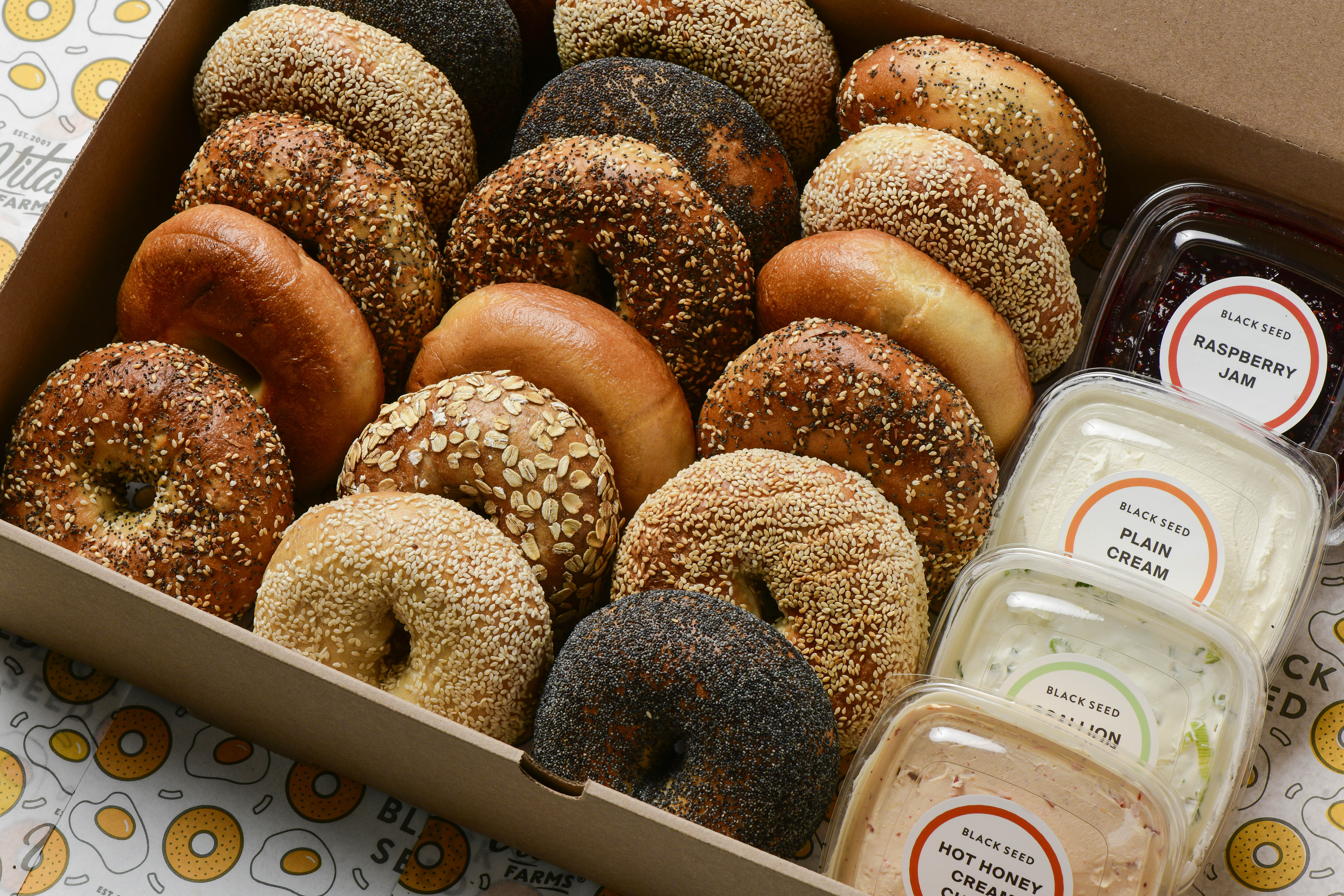a box filled with different kinds of donuts