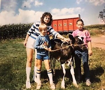 a person riding a horse in a field