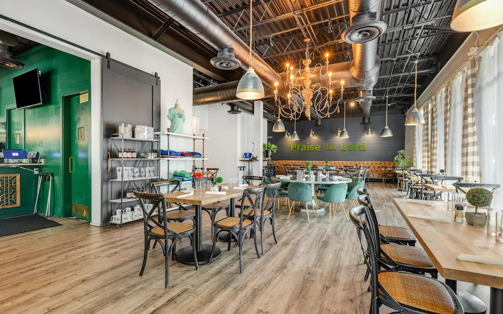 a room with tables and chairs