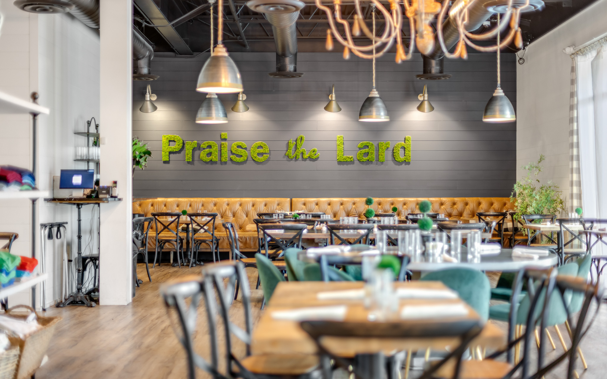 a restaurant with tables and chairs