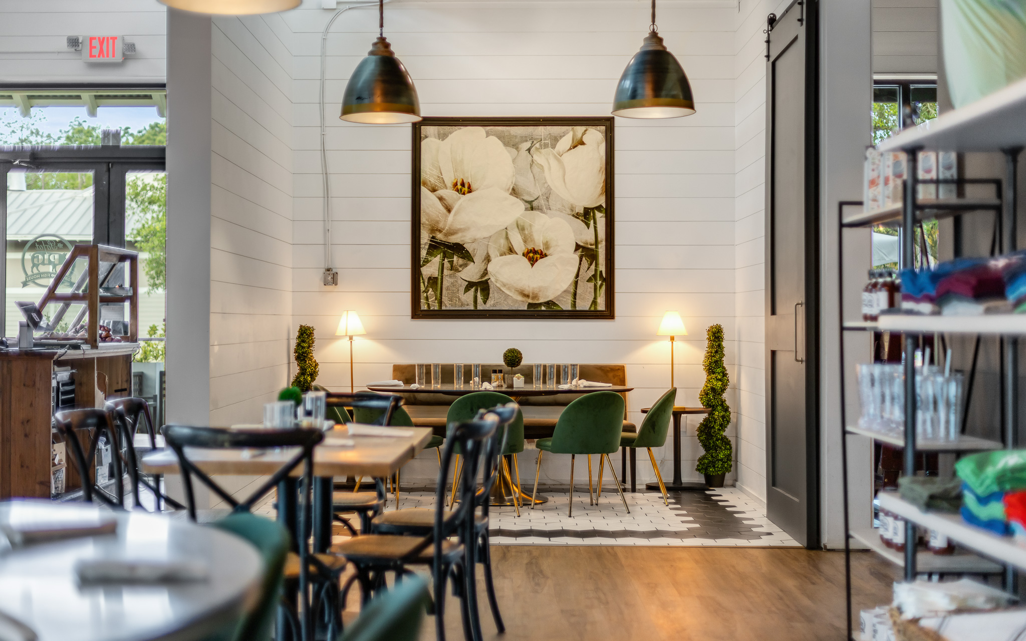a room with a painting of flowers