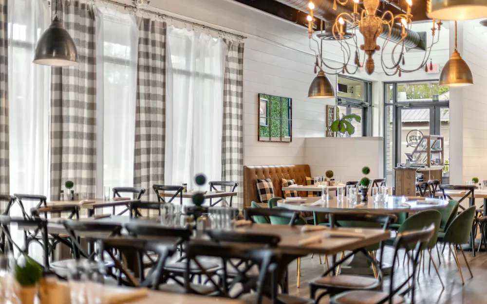 a room with tables and chairs