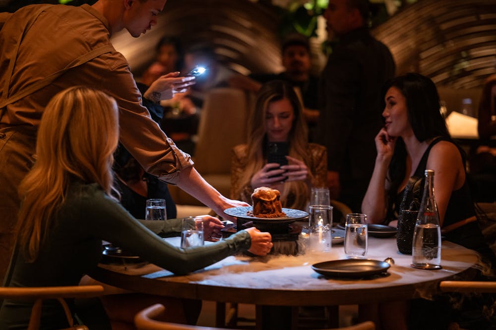group enjoying the exquisite desert