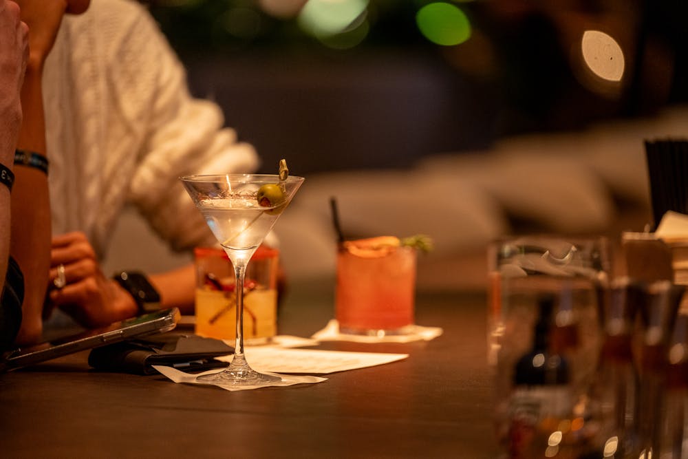 grab drinks at the bar for the perfect vibe of a late night escape