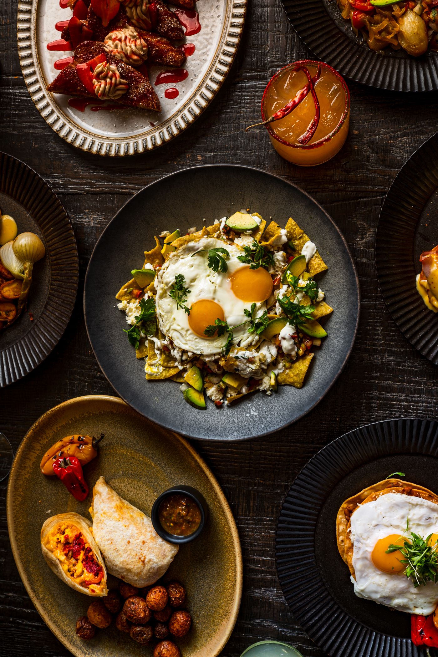 Modern Mexican brunch dishes arranged on a table at Amaya