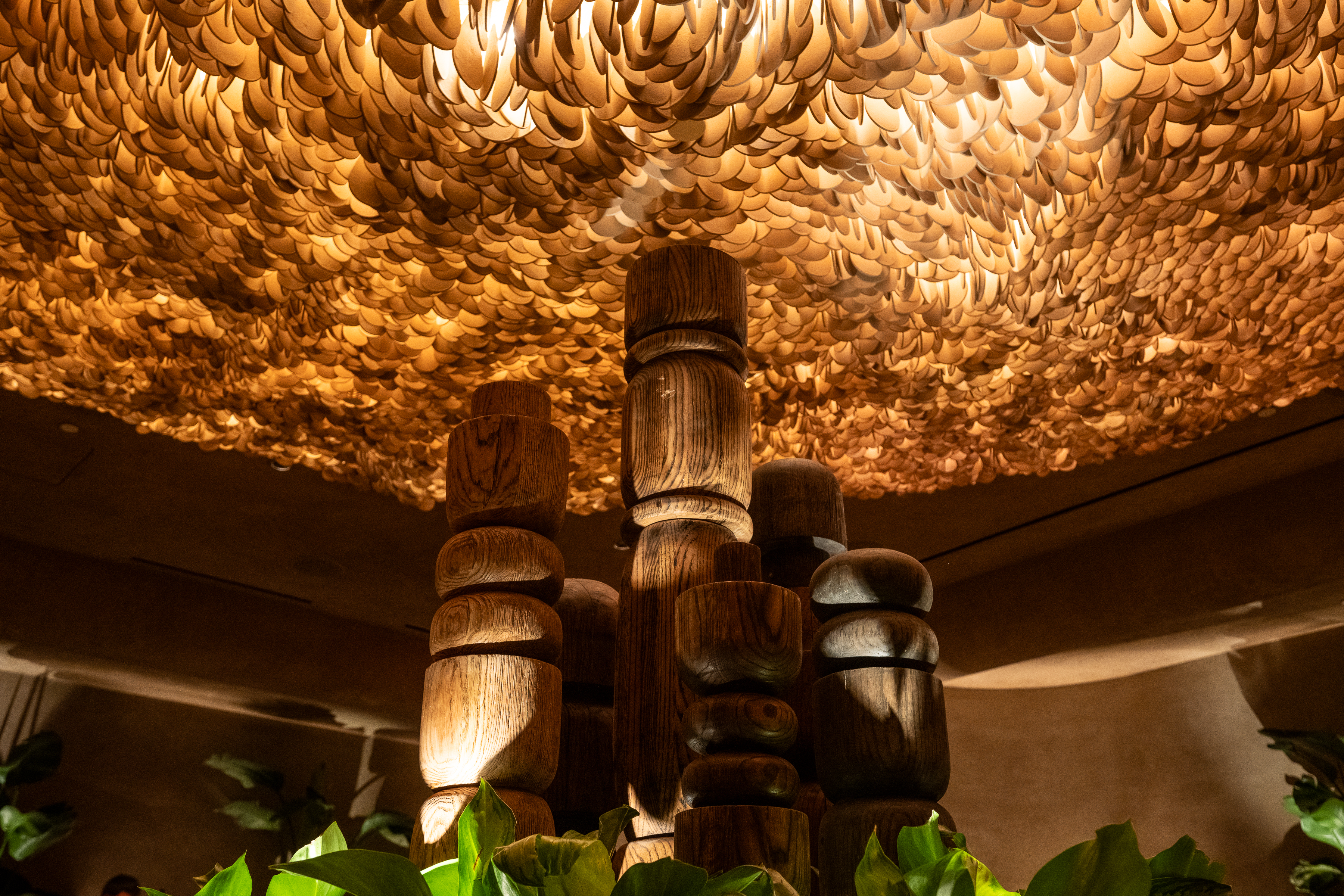 a wooden pillars and a light fixture