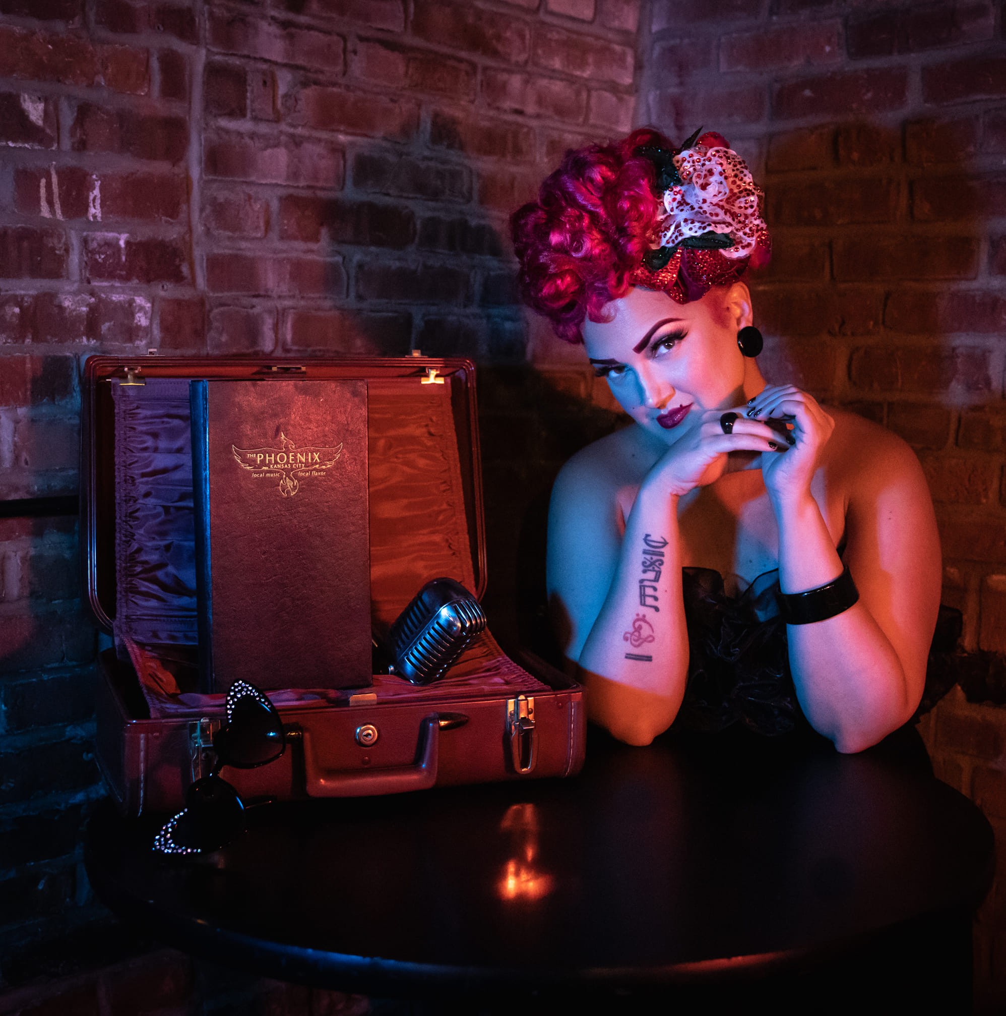a girl sitting on a table