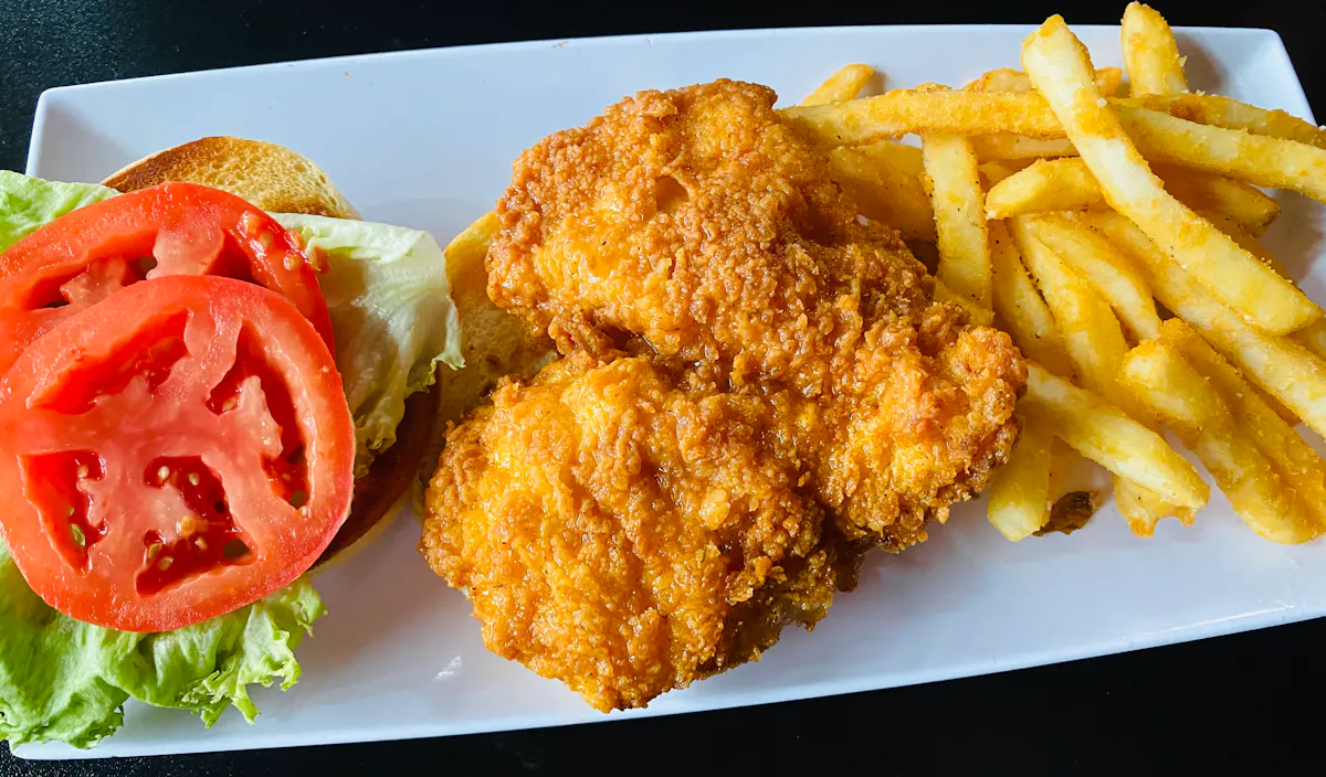 a sandwich and fries on a plate