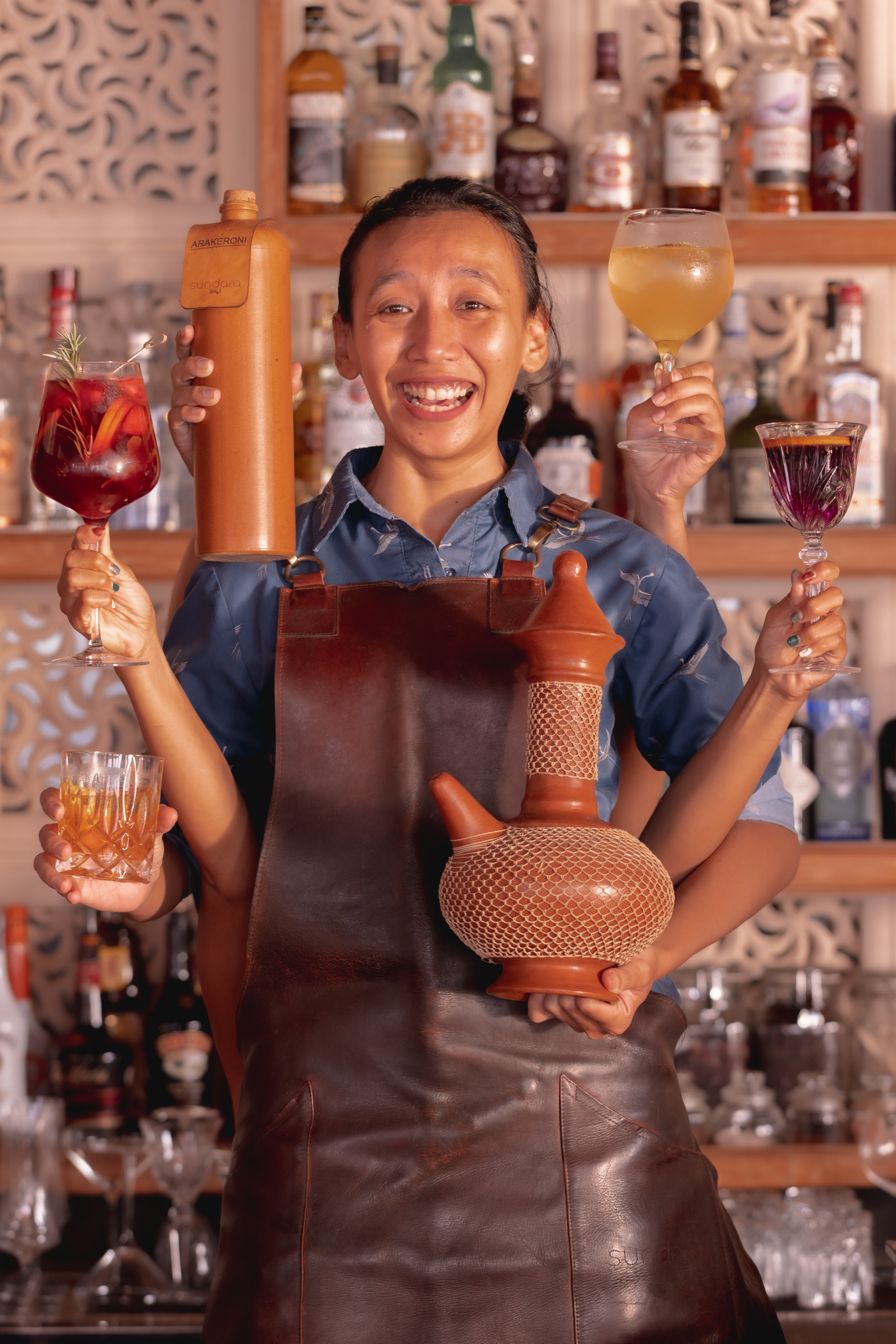 a person holding a glass of wine