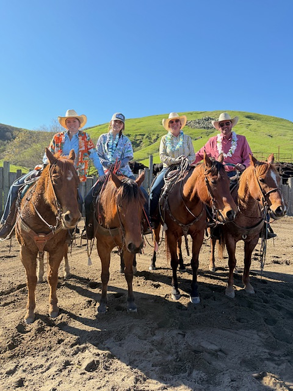 a group of people on horses