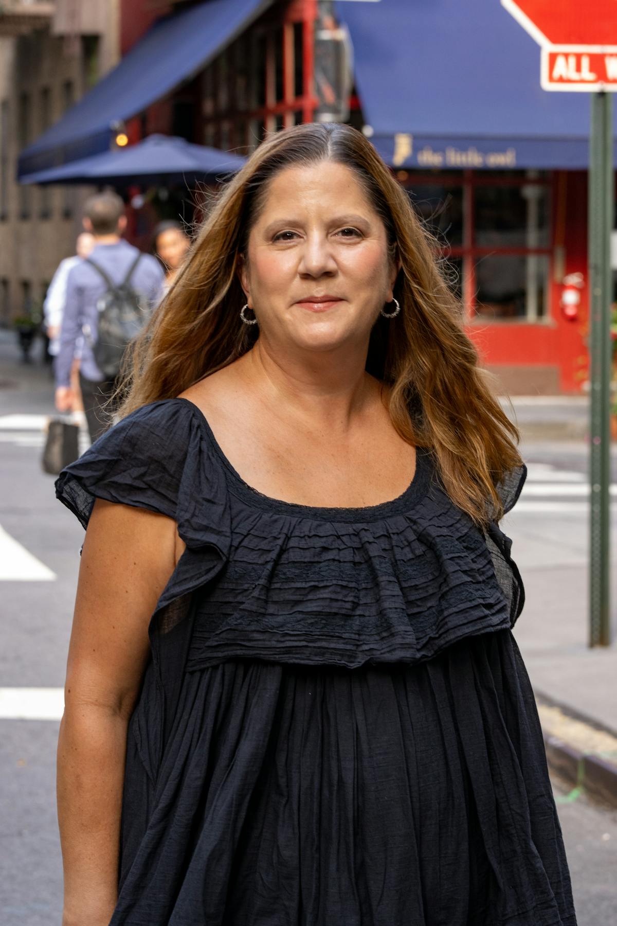 a woman walking down the street