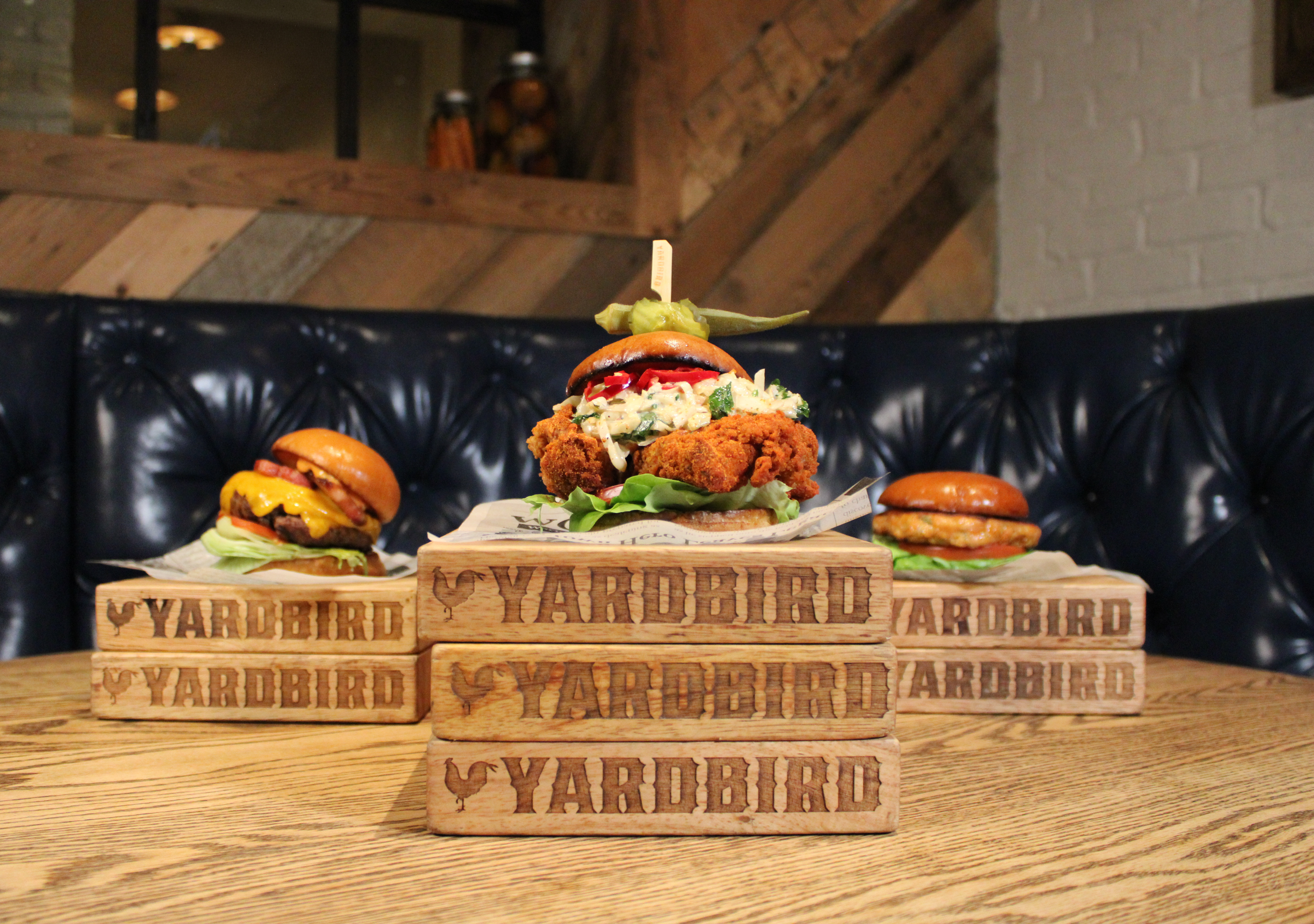 a group of burgers on a table