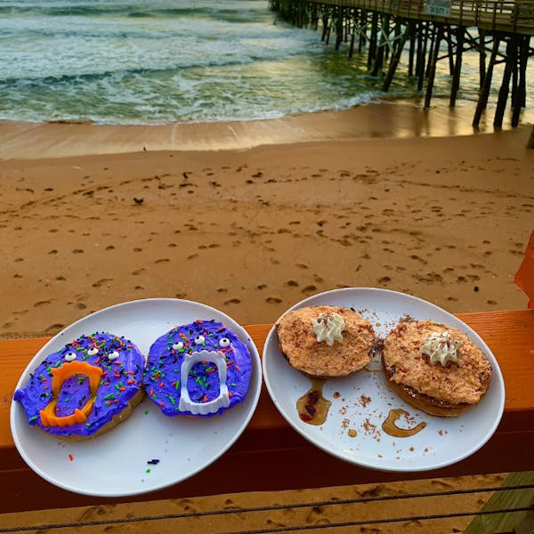 a plate of food on a beach