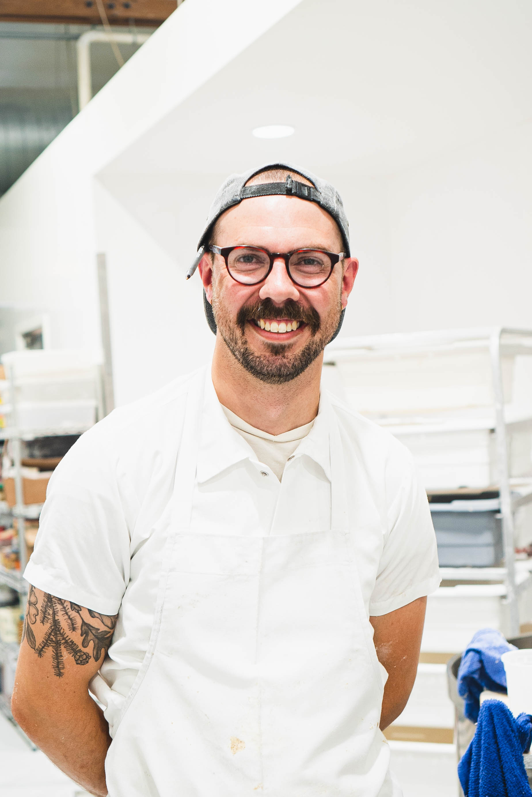 a man standing in a kitchen