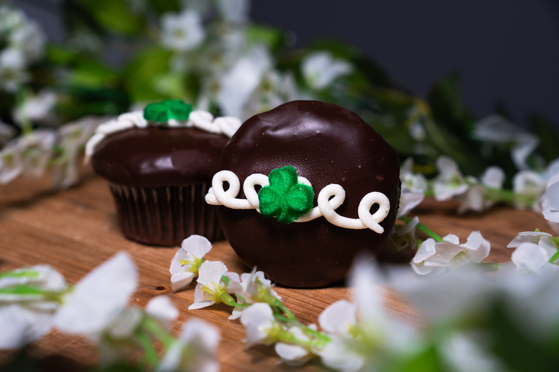 a cupcake with a shamrock on it