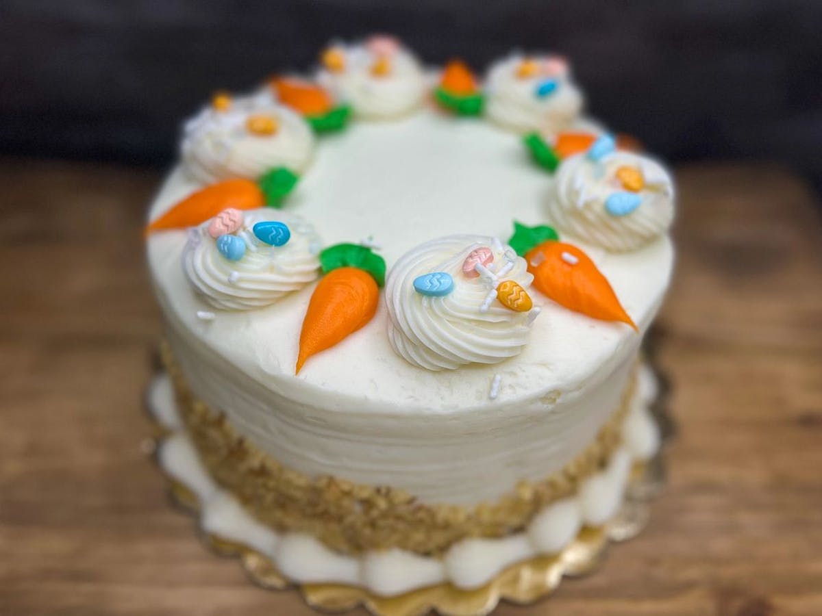 a close up of a decorated cake on a table