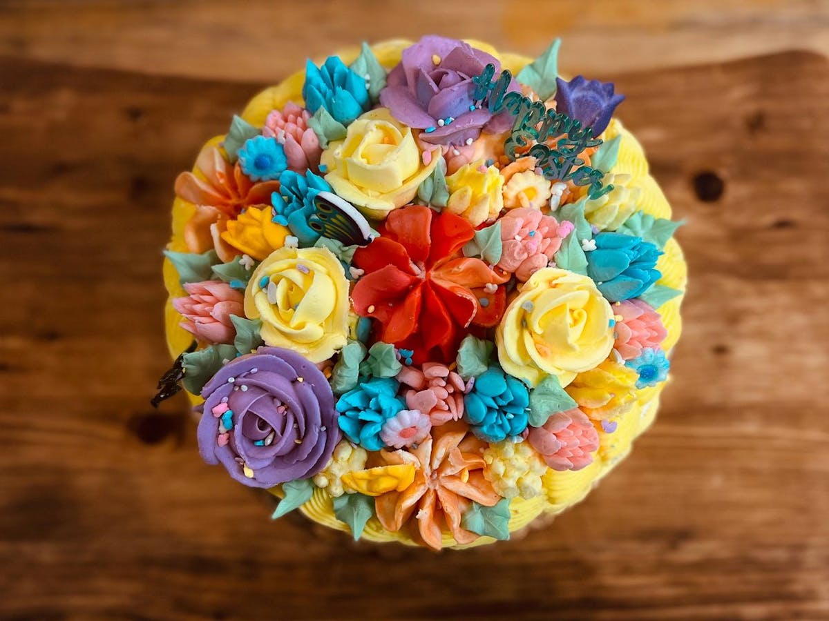 a colorful flower on a table