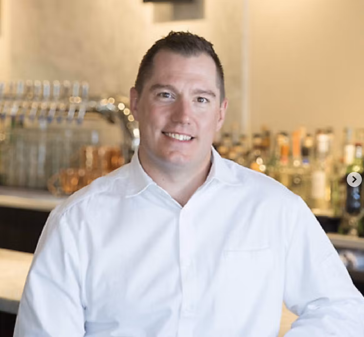 a man smiling for the camera