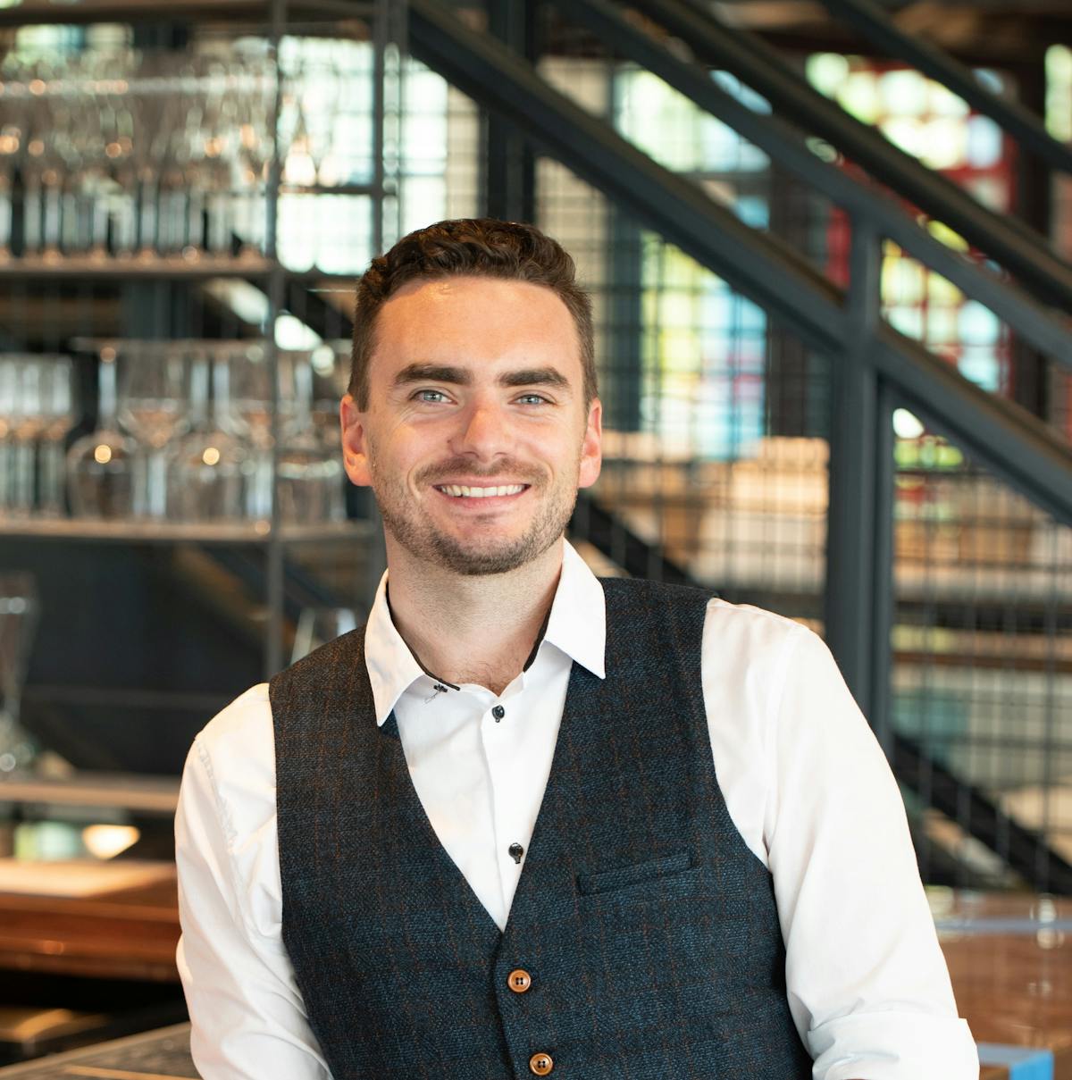 social media manager standing in a seafood restaurant