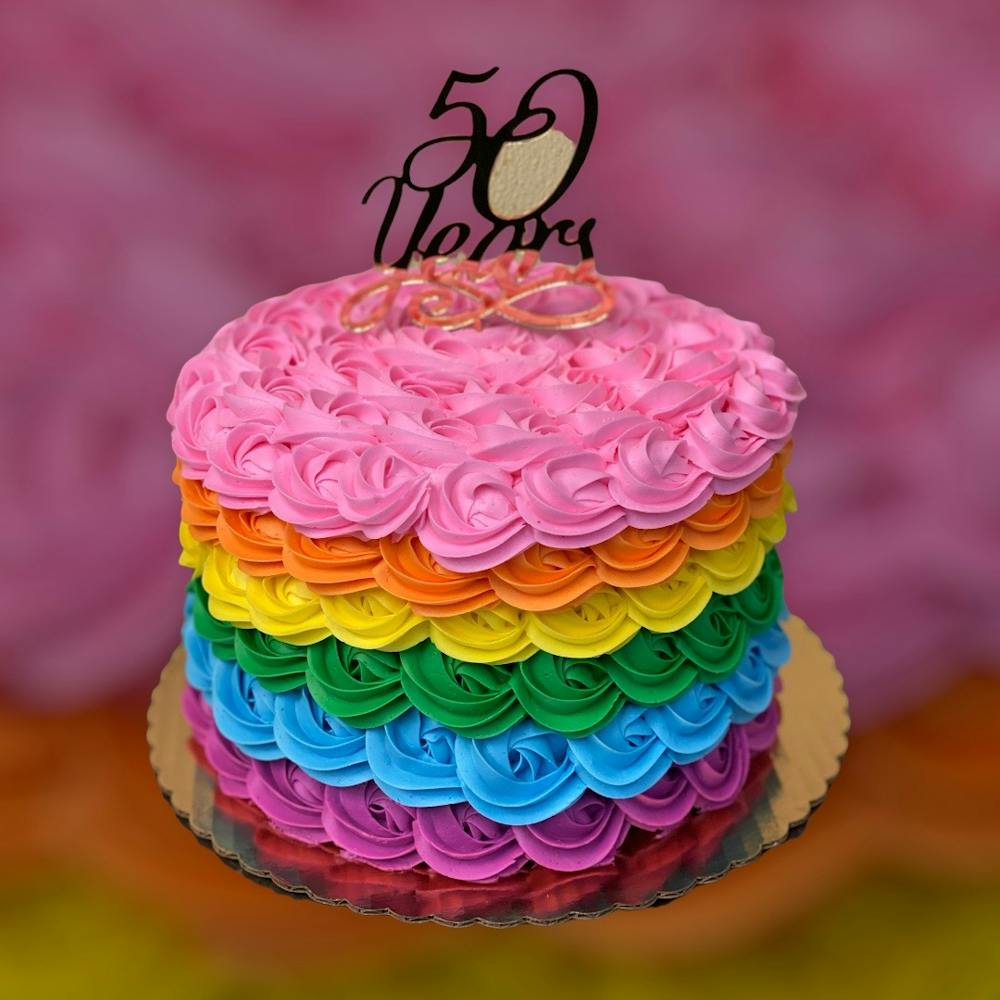 a pink birthday cake