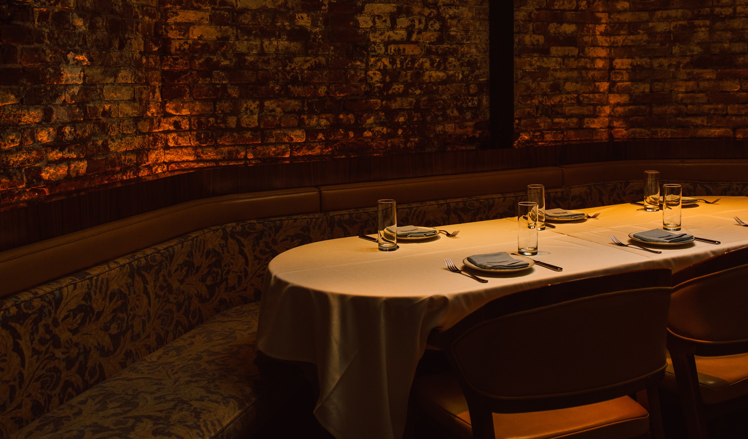 a hotel room with a sink and a mirror