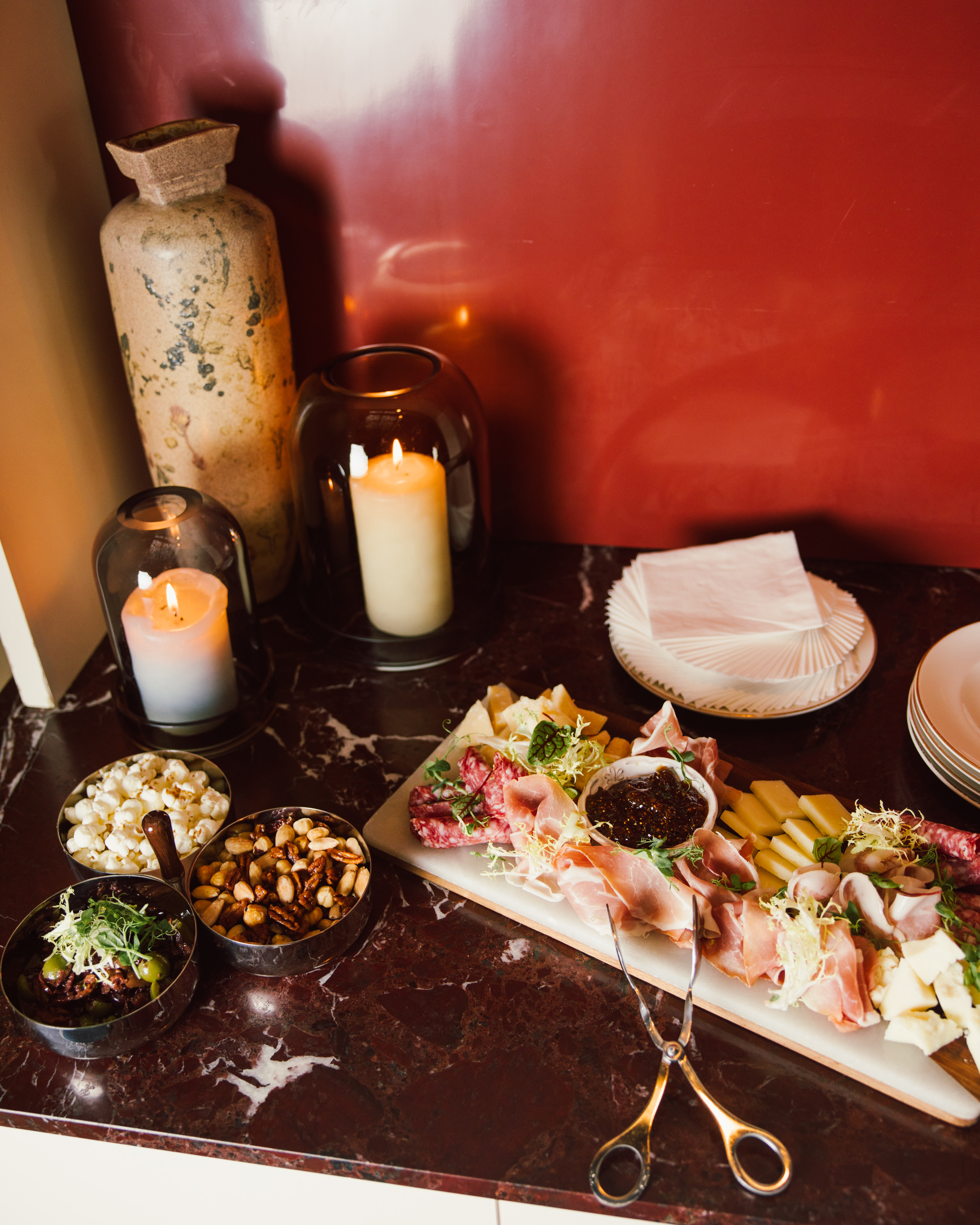 a table topped with plates of food