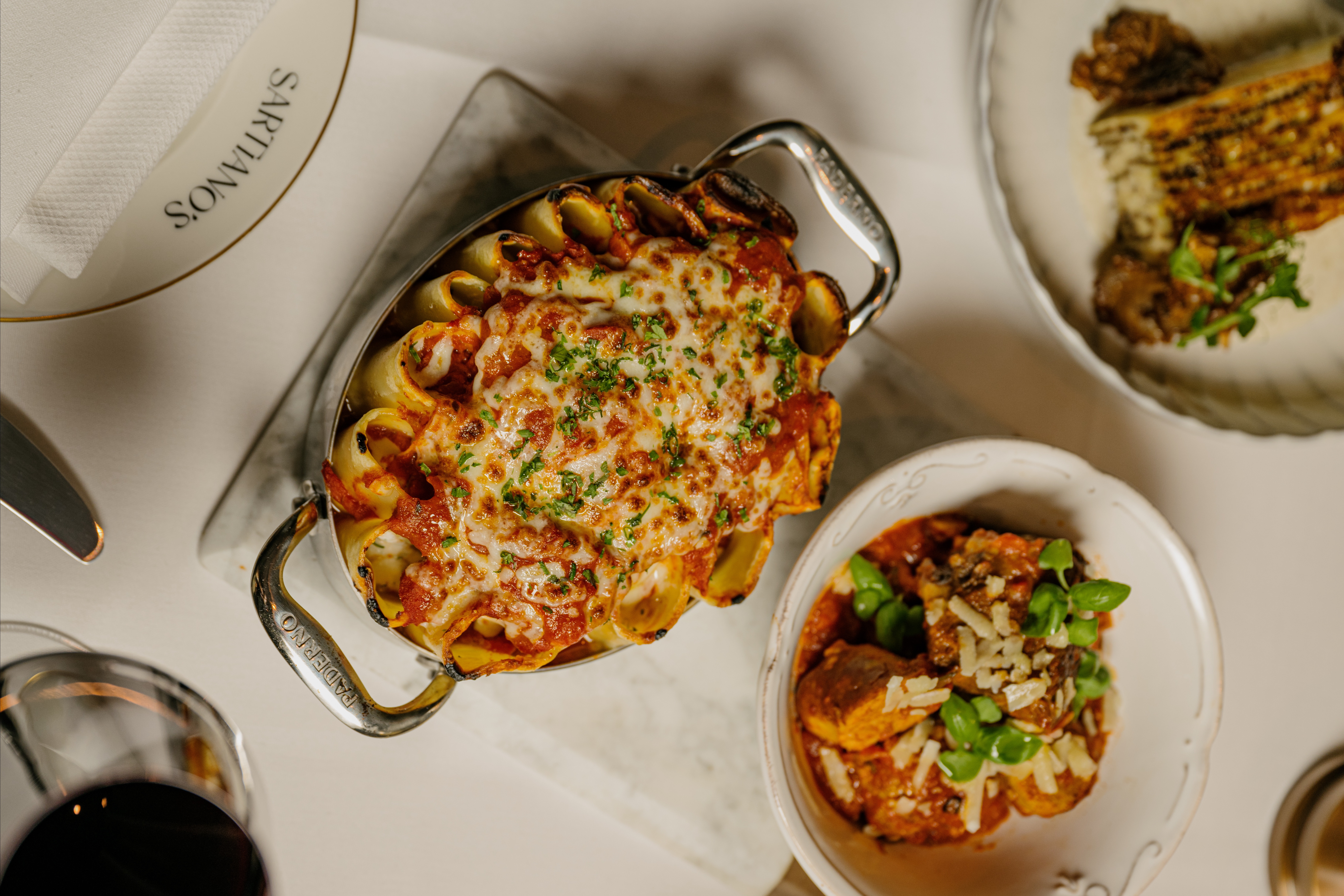 a pizza sitting on top of a plate of food