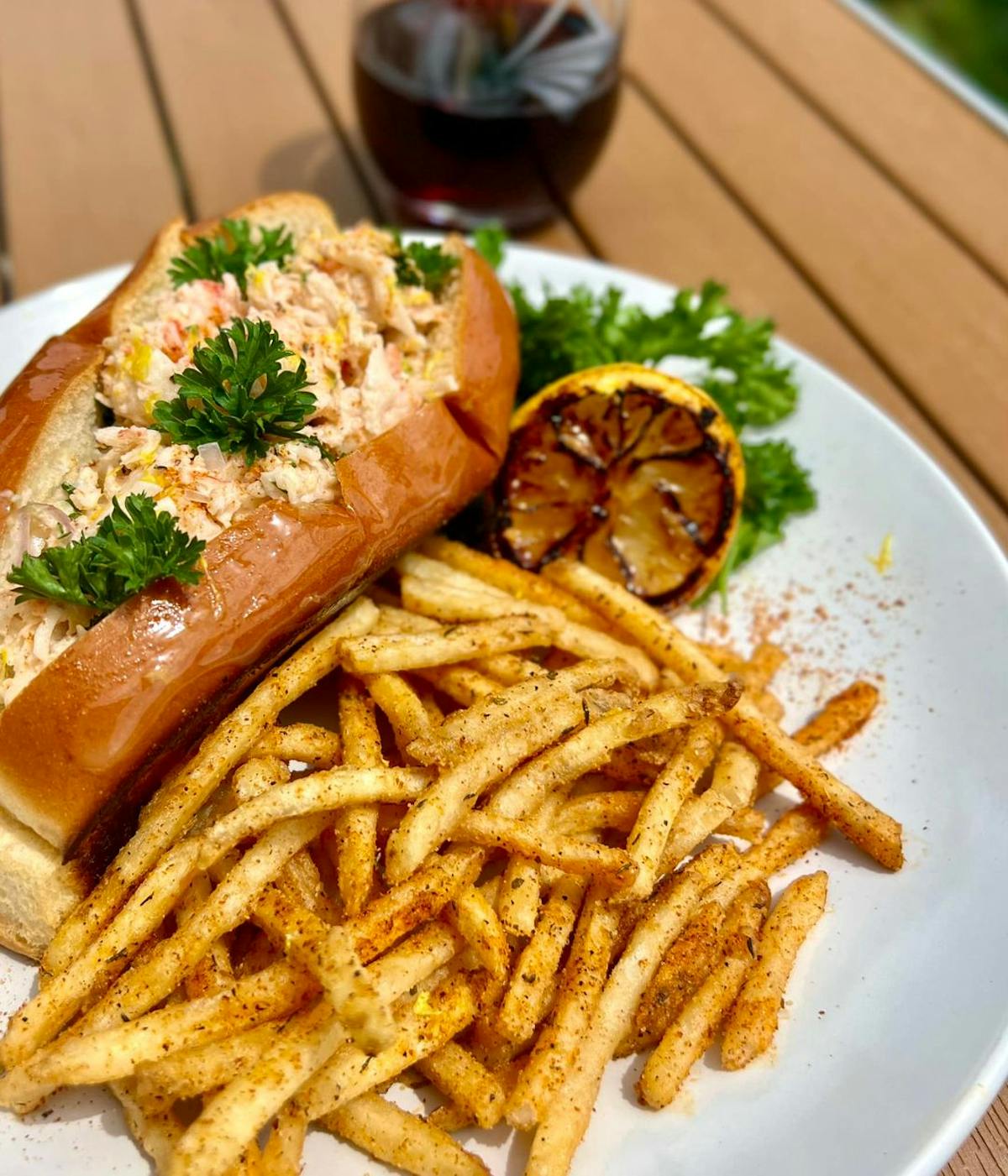 a plate of food that is sitting on the side of fries