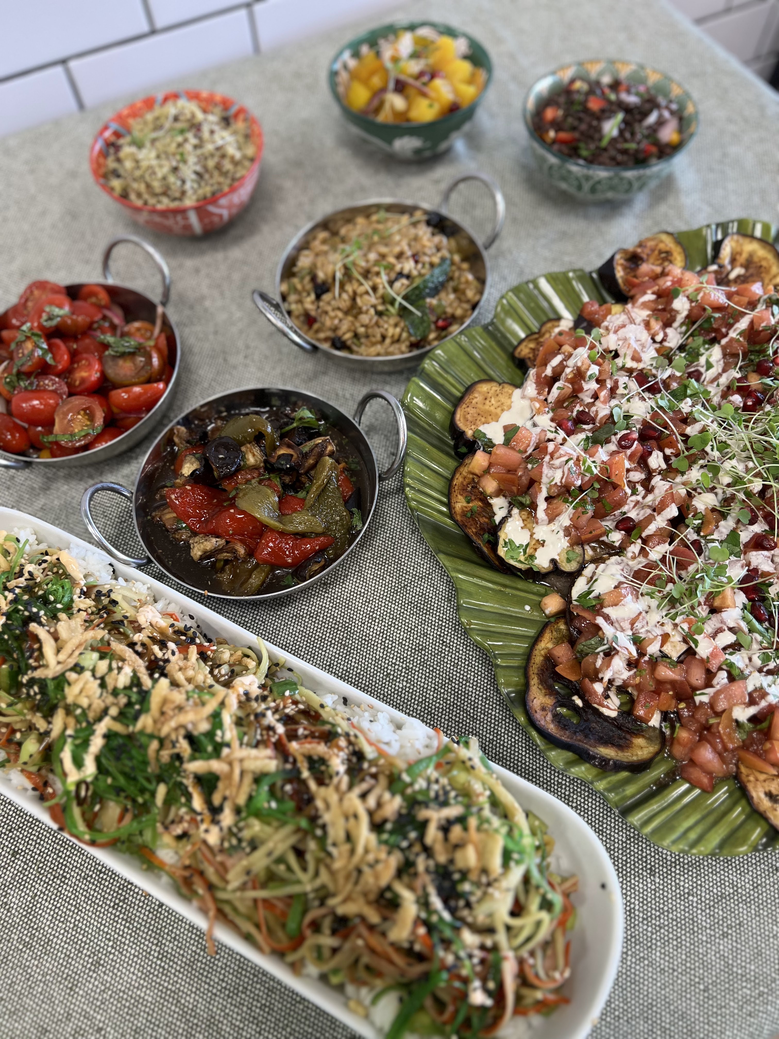 a bunch of different types of food on a table